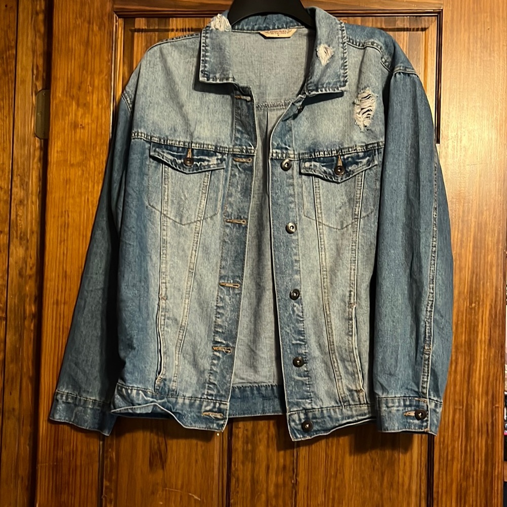 Distressed denim jacket